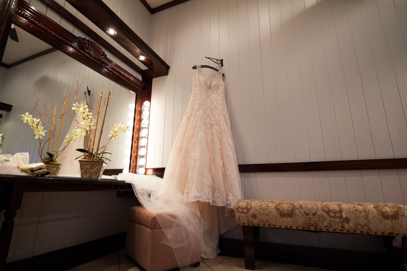 Bridal Portrait Gown Hangs in Dressing Room Hollywood Venue Tampa FL