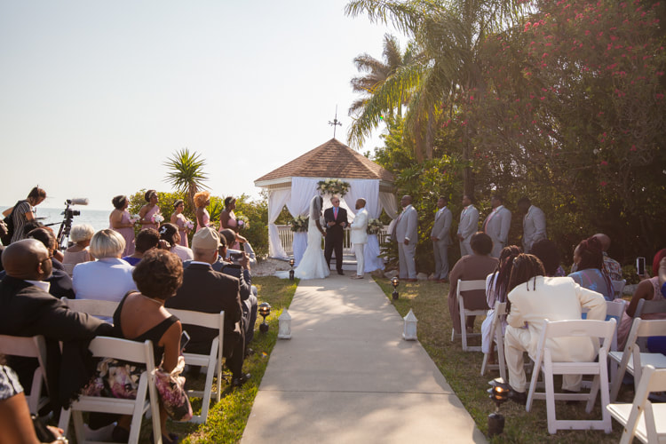 wide shot of wedding ceremony at The Rusty Pelican in Tampa