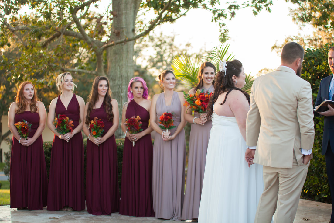 bride and groom with bridesmaids at citrus hills country club